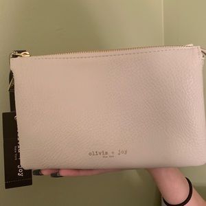 Olivia + Joy Cream colored cute clutch purse.